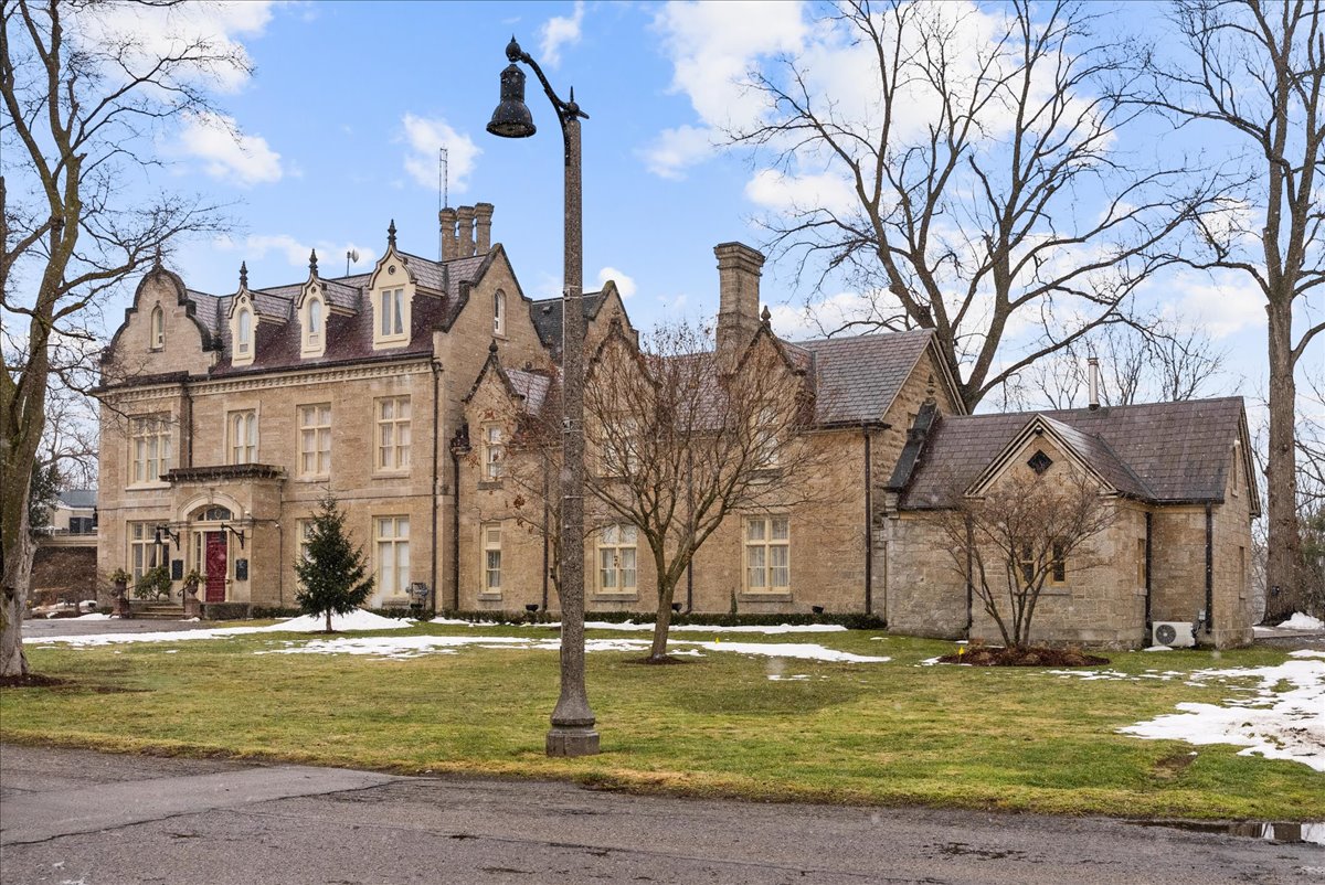 Rodman Hall seen from the grounds, a stone heritage residence in St. Catharines